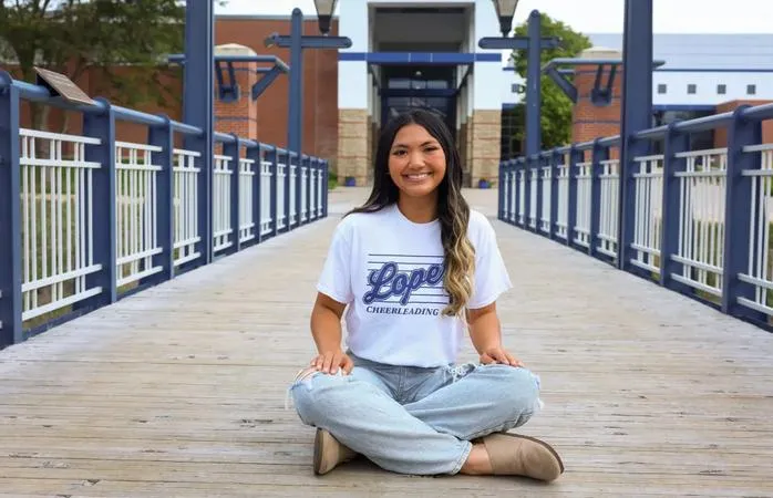 Cheer Captain Sonthana Represents UNK with Pride