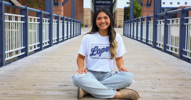Lexington native Nikki Sonthana leads UNK Cheer team as head captain