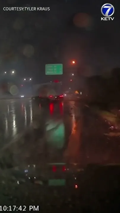 Semi-truck jackknifes on I-80 as heavy rain pounds Omaha (Video)