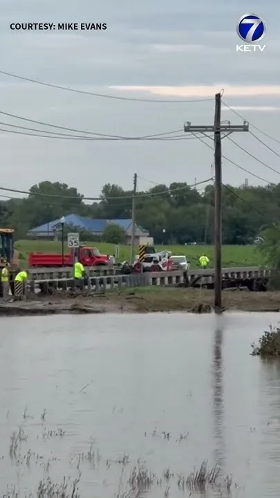Cleanup on Highway 370 after flash flooding in Nebraska (Video)