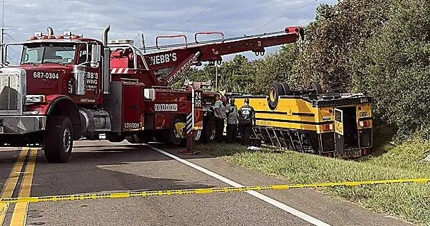 2 people killed, including a student, after Florida school bus rolls over