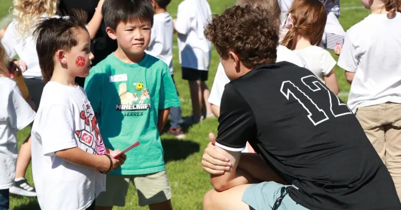 Meet at the 50: Two generations of Bearcats connect at stadium