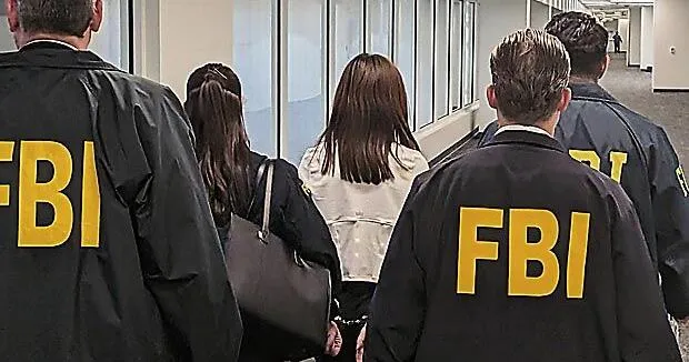 FBI arrests California woman accused of spying on Taiwan leader's family for China