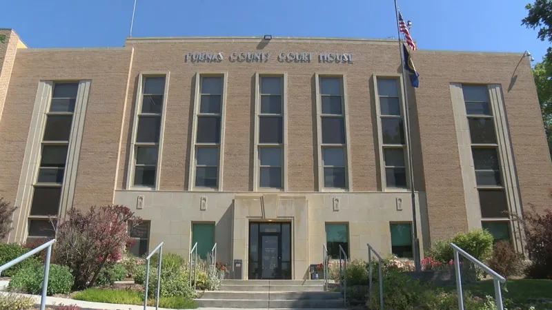Arapahoe man charged with stalking woman, placing tracking device on vehicle