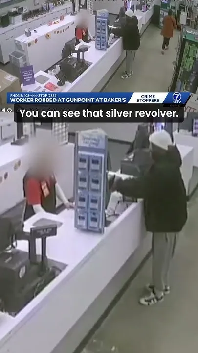 Surveillance video shows woman robbed at gunpoint at a Baker's in Omaha (Video)