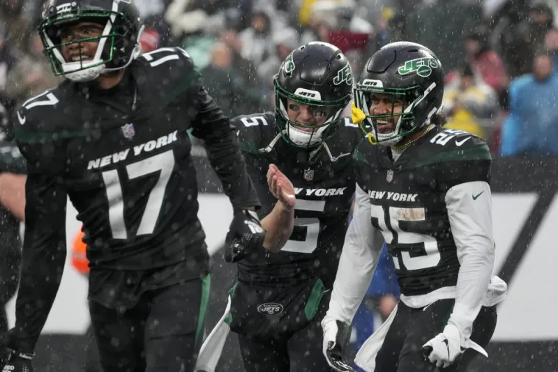 AFC EAST: White takes flight as Jets roll; Dolphins cruise