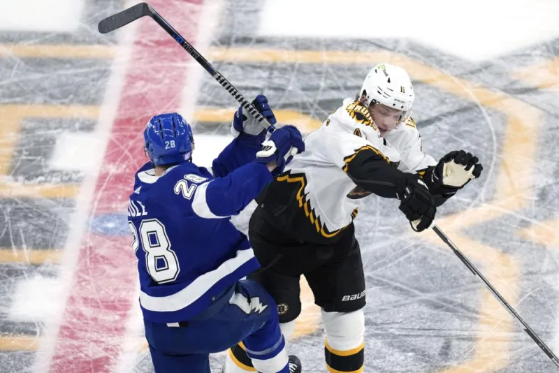 Hall's two goals helps Bruins keep home streak going