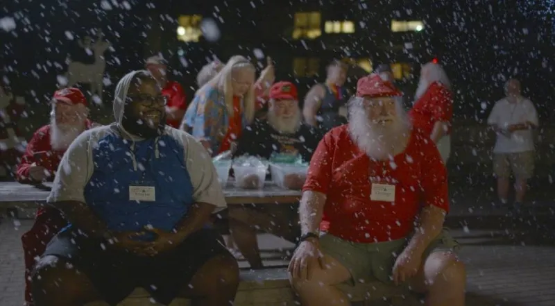 He was harassed for the Black Santa on his lawn. Now, he's a professional Black Santa.