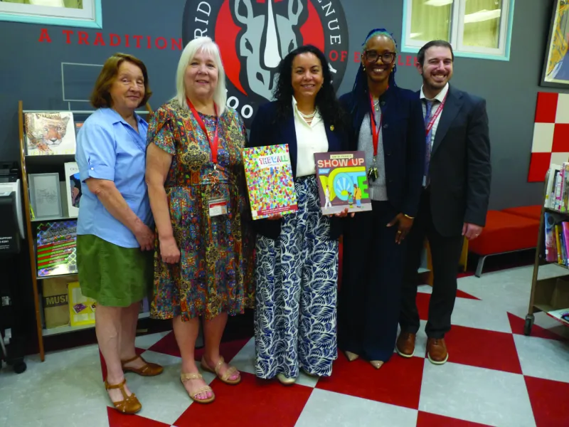 Mejia reads to third-graders