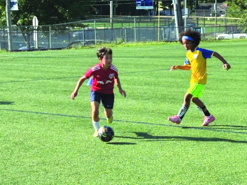 Getting their kicks at the Doug Nevins Soccer Camp - Photo Gallery
