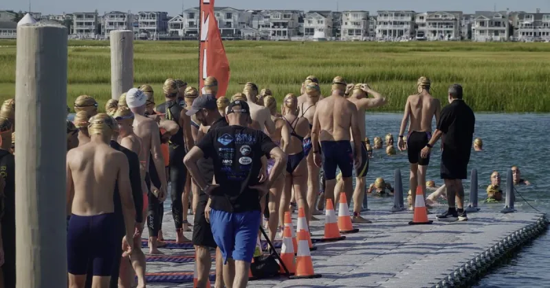 An Olympic champion and a good cause highlight Avalon swim for U.S. service members