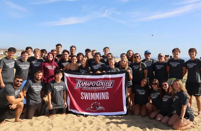 SWIM TEAM PARTICIPATES IN METERS FOR MIKE