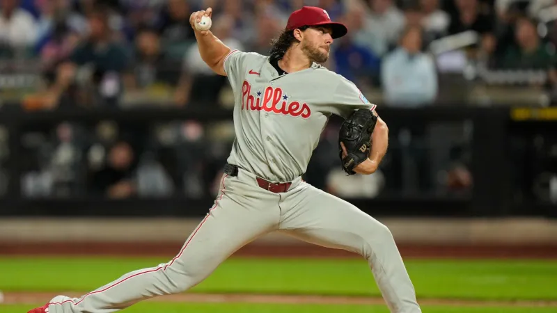 Nola dominates Mets in 3-0 win as Phillies tie Cubs for top NL wild...
