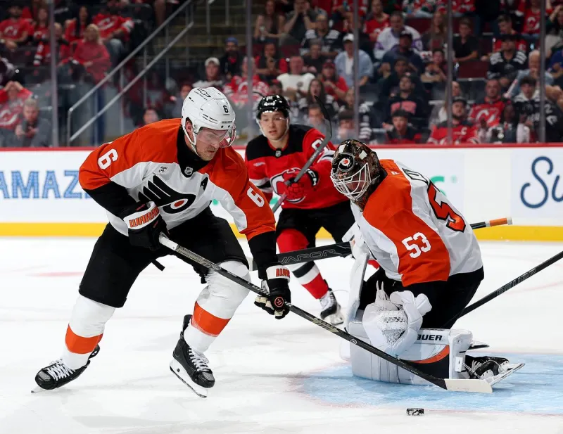 Hughes Brothers Help Devils Down Flyers in OT