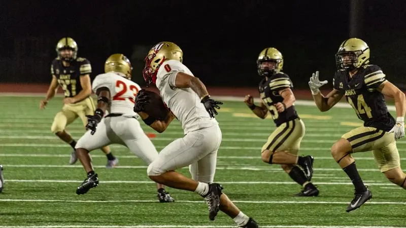 Smith Throws for 137, Runs for 65, Sprint Football Falls to Mansfield
