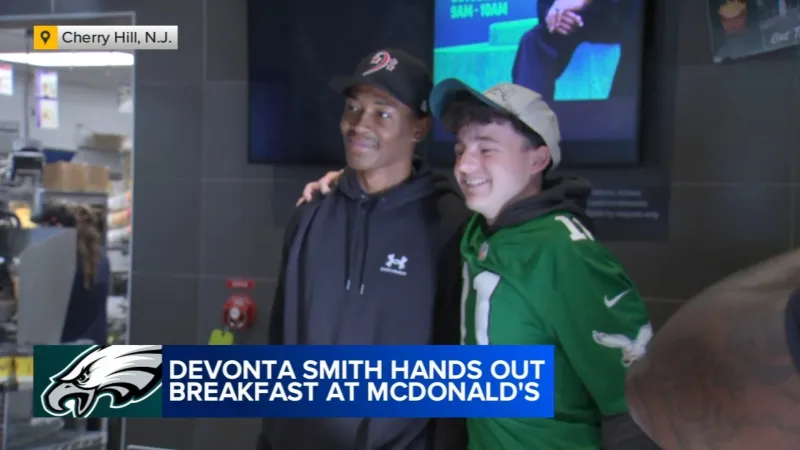 DeVonta Smith hands out breakfast at McDonald's in Cherry Hill