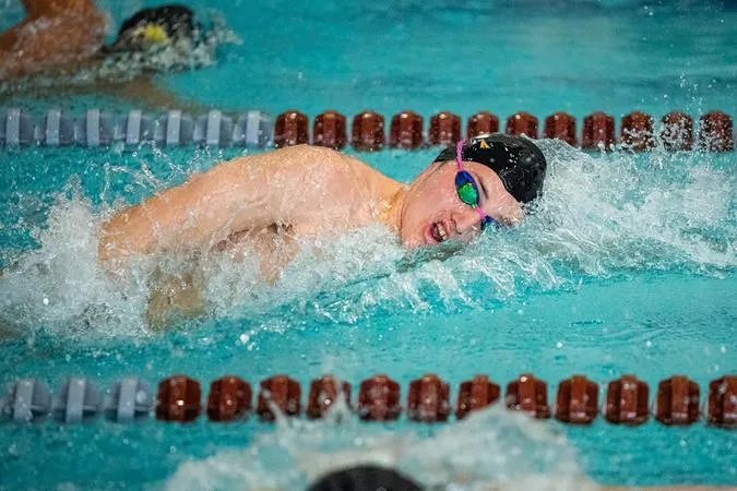Men's Swimming Edged by Rowan, 135-127