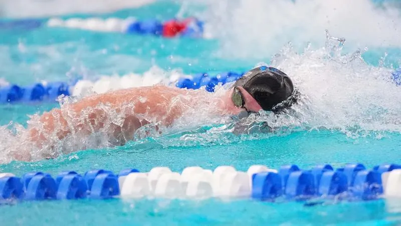 Sheehan Shines as Men's Swimming Slips Past Stevens, 135-127, in Season Opener