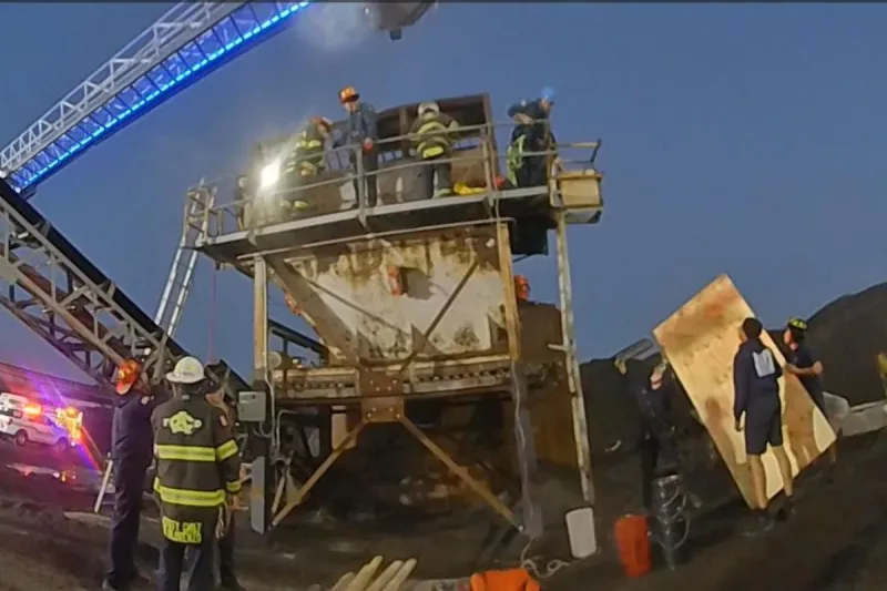 Worker trapped in asphalt as 10 tons of material loomed overhead