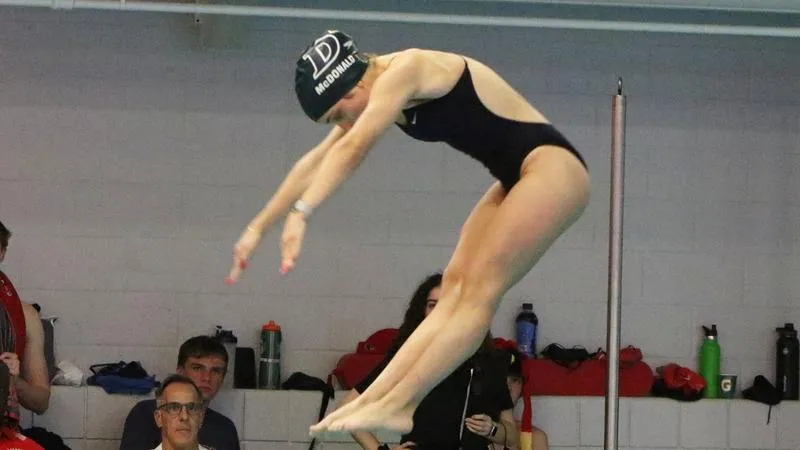 Women's Swimming & Diving Captures Eight Events in Loss at Catholic