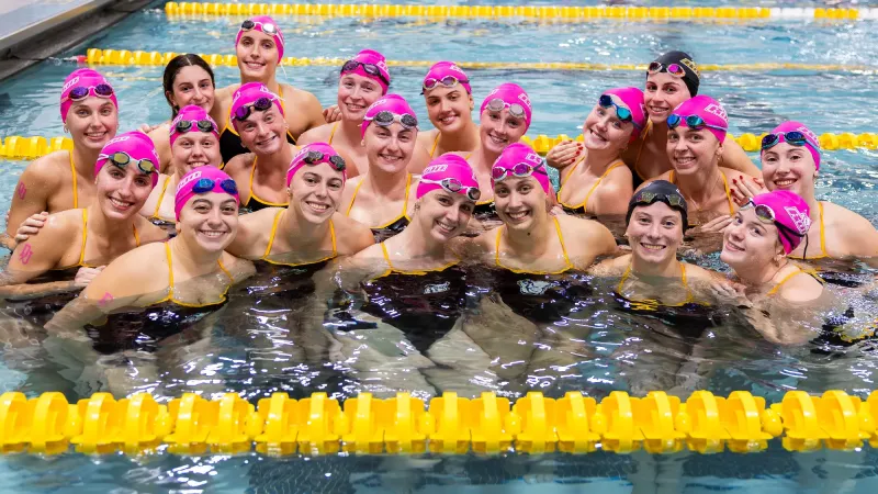 Rowan Women's Swimming cruises past Montclair State in Pink Out win