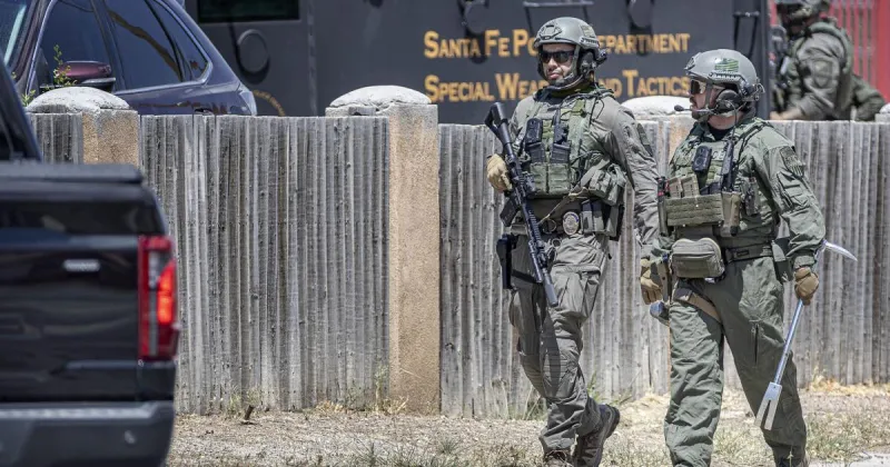 Robbery suspect turns self in to Santa Fe police; Airport Road closed during search