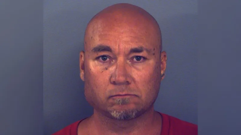 Doc: Knife-wielding man chased shoppers at Outlet Shoppes, prompting one to draw a handgun