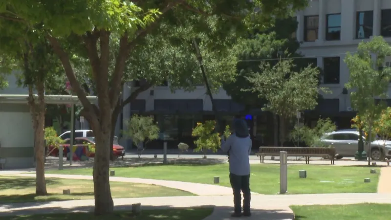 Downtown El Paso crews tend San Jacinto Plaza as triple-digit heat continues this week