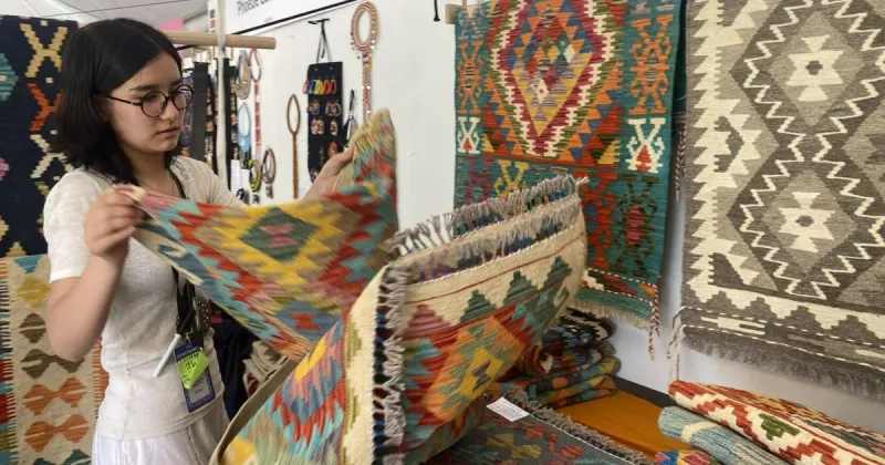 Afghan merchants empower women artists at Santa Fe's folk art market