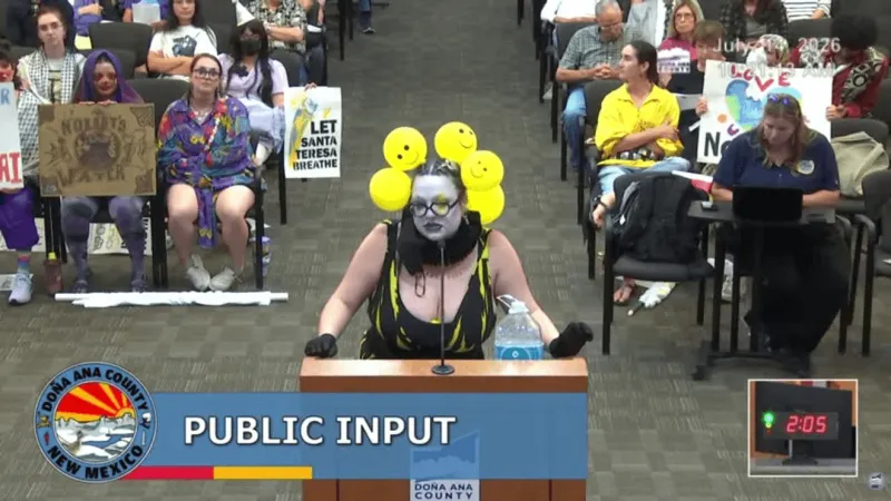 Residents dressed up as clowns speak out on Project Jupiter at Doa Ana commission meeting