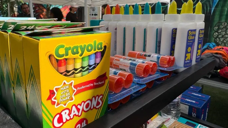 Benefit car show helps collect school supplies for students