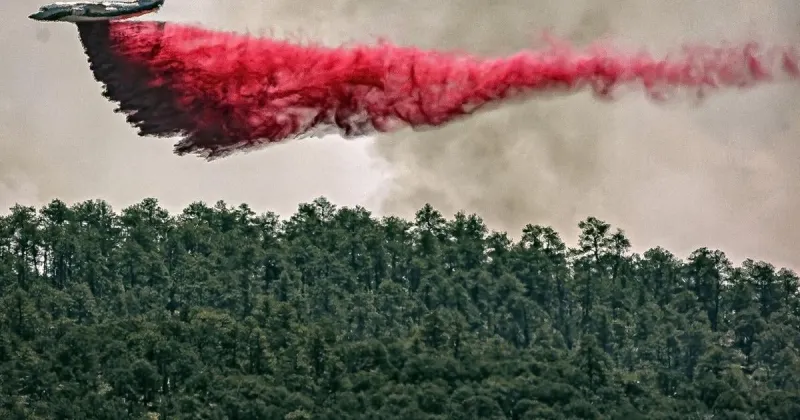 Fire burning in national forest north of Santa Fe