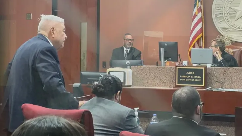 Double-murder trial continues as jury views photos of second crime scene