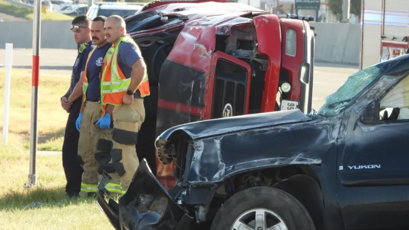 Woman, 8-year-old child killed in rollover crash on I-27 near Georgia Street