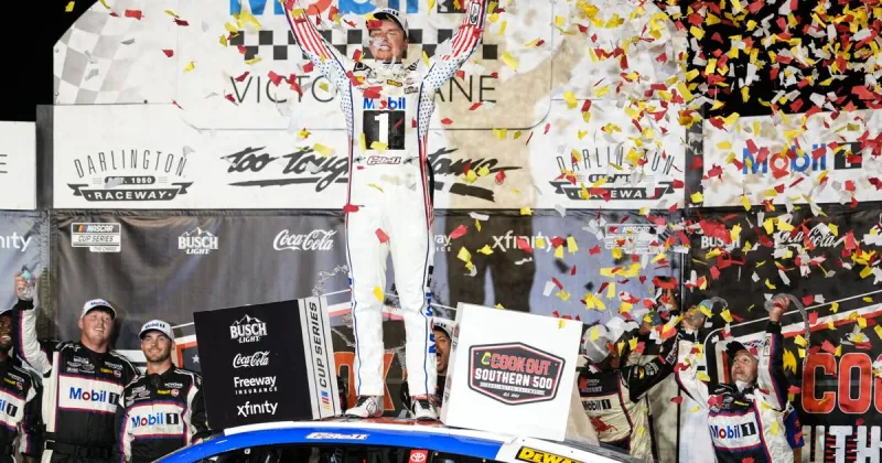 Bell passes defending NASCAR champion Larson to win the Southern 500 to start the Chase