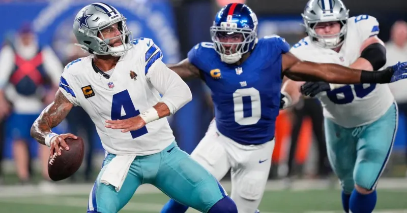 Giants' offense rolls over Cowboys to give coach John Harbaugh 28-20 win in his debut