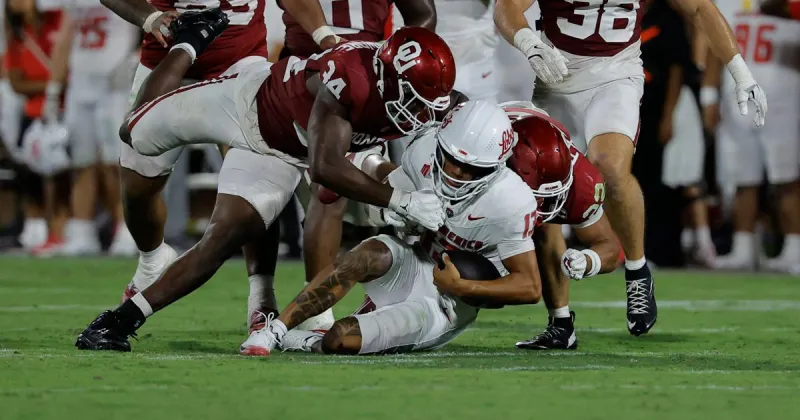 UNM plays No. 24 Oklahoma tight, but falls short in 14-6 loss