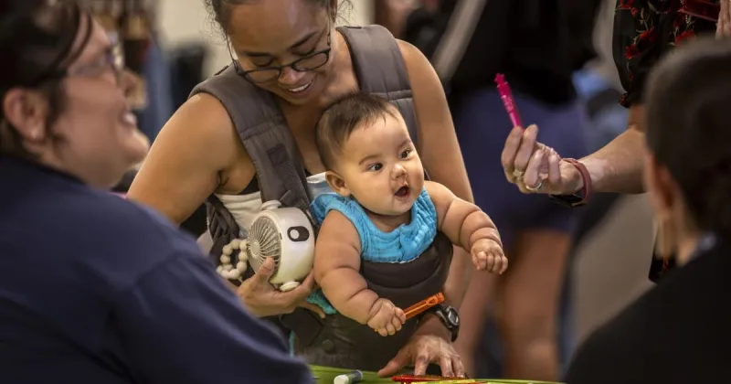 Despite rain, attendance strong at yearly south-side business fair