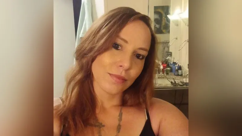 Suspect shot victim in head before burying her behind garage, document says