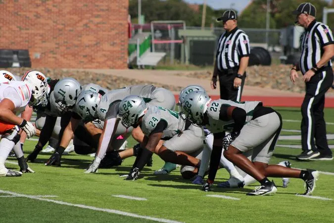 Cooper Accounts for Five Touchdowns as Greyhounds Fall in Chile Bowl Thriller