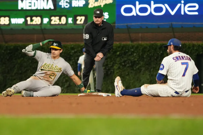 A's rally for tie in eighth before Kurtz wins it in 10th