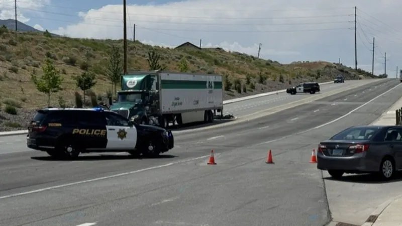 Motorcycle, semi-truck crash blocks both directions at 8000 N. Virginia St.