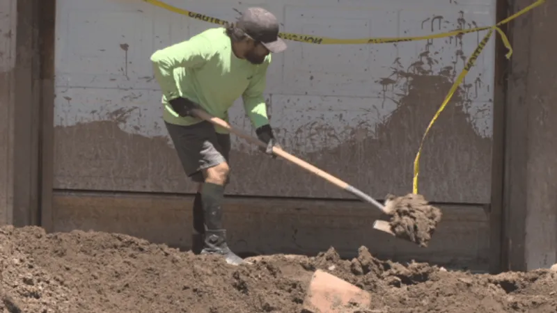 Hidden Valley residents pitch in to help neighbors after flash flooding buries homes in mu