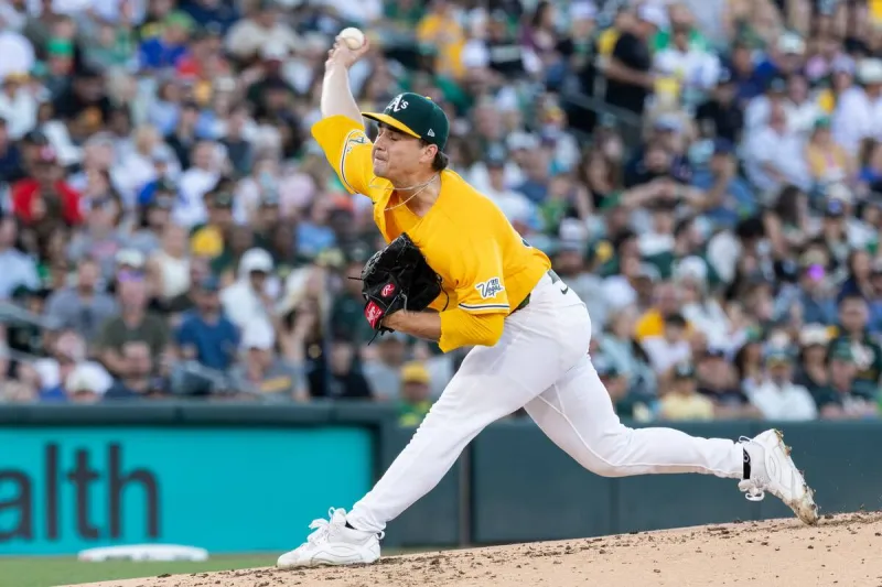 Ginn loses no-hitter in 7th inning as A's rout Nationals to stop 10-game skid