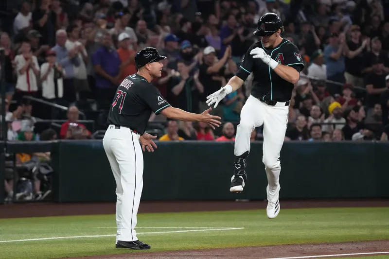A's rally, but lose in extras to Diamondbacks
