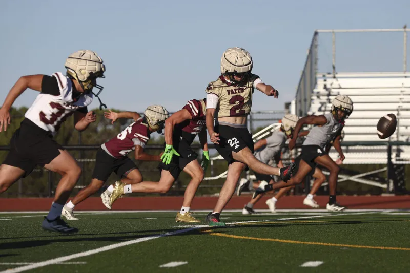 'Going to be a marathon': Prep football teams open fall camps - PHOTOS