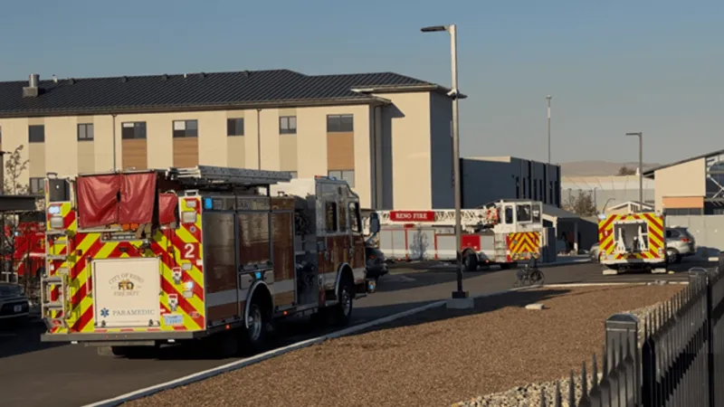 One hospitalized after blaze contained to single room near Cares Campus complex