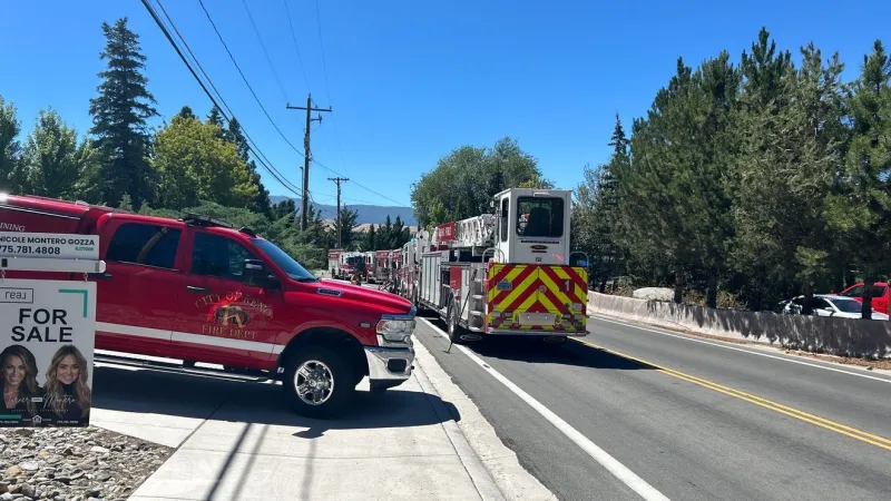 Firefighters respond to structure fire on Plumb Lane; road closed both directions