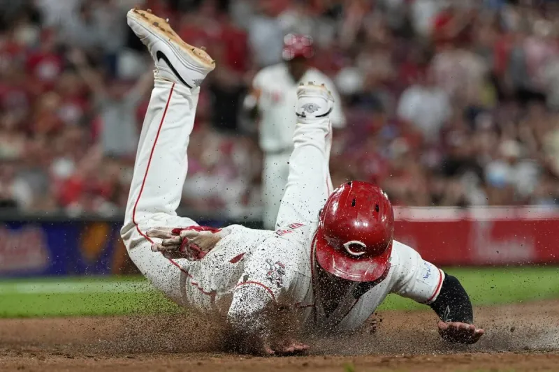 Wild pitches doom A's in one-run loss to Reds