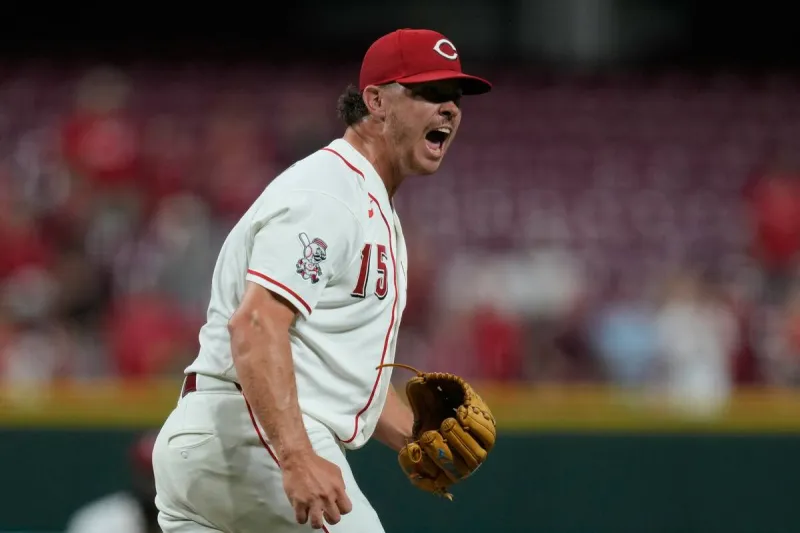 McLain homers to back Lowder in the Reds' 3-2 victory over A's